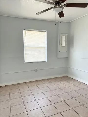 en empty room with windows