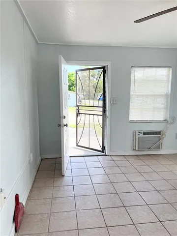 a view of an empty room and window