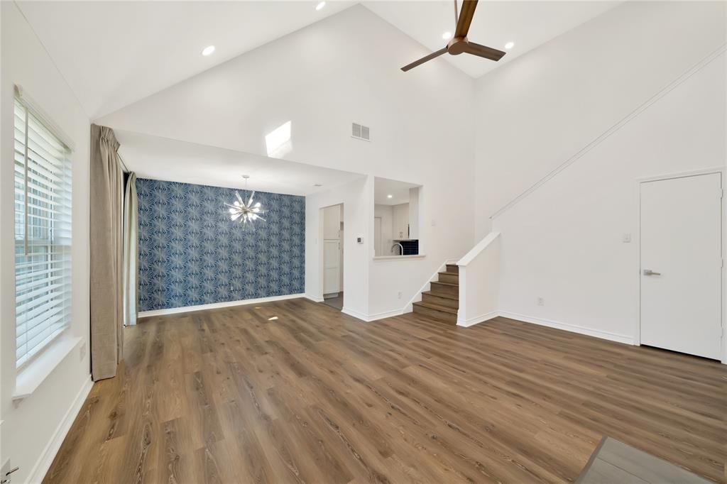 2909 Normandy Court Euless, TX 76039 - Photo 2 of 36 an empty room with wooden floor and windows