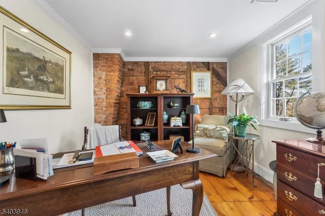 a utility room with a barbeque and trees