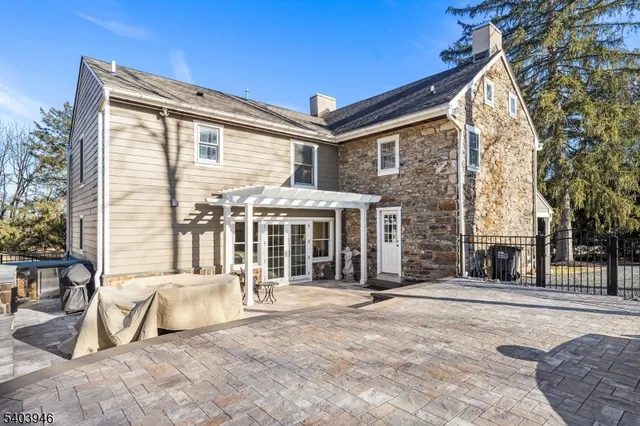 a view of a yard with a large tree