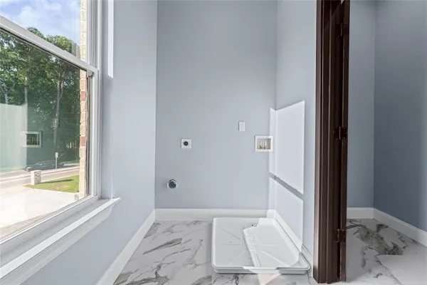 a view of an entryway with a window