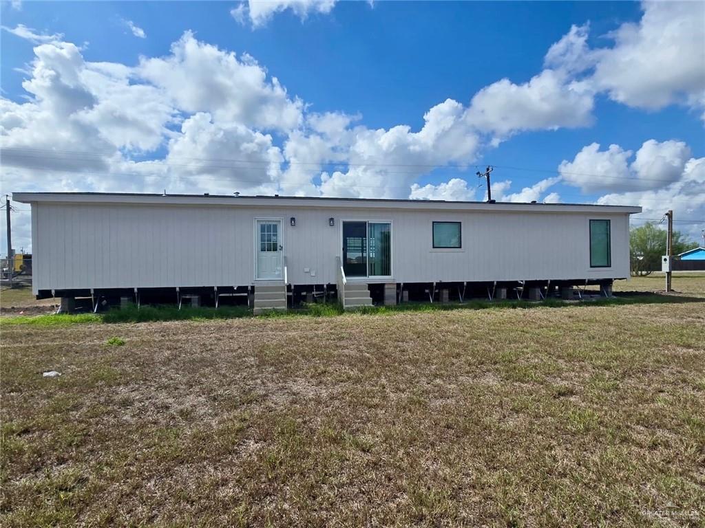 36223 Ranch Park Road San Benito, TX 78586 - Photo 2 of 4 a view of a house with a yard