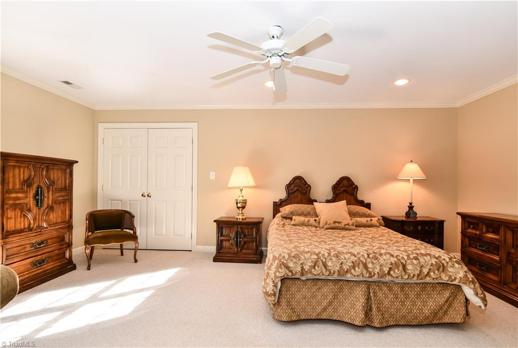 6615 Stonecroft Drive Oak Ridge, NC 27310 - Photo 22 of 30 Third bedroom has window to backyard and Jack and Jill bath.