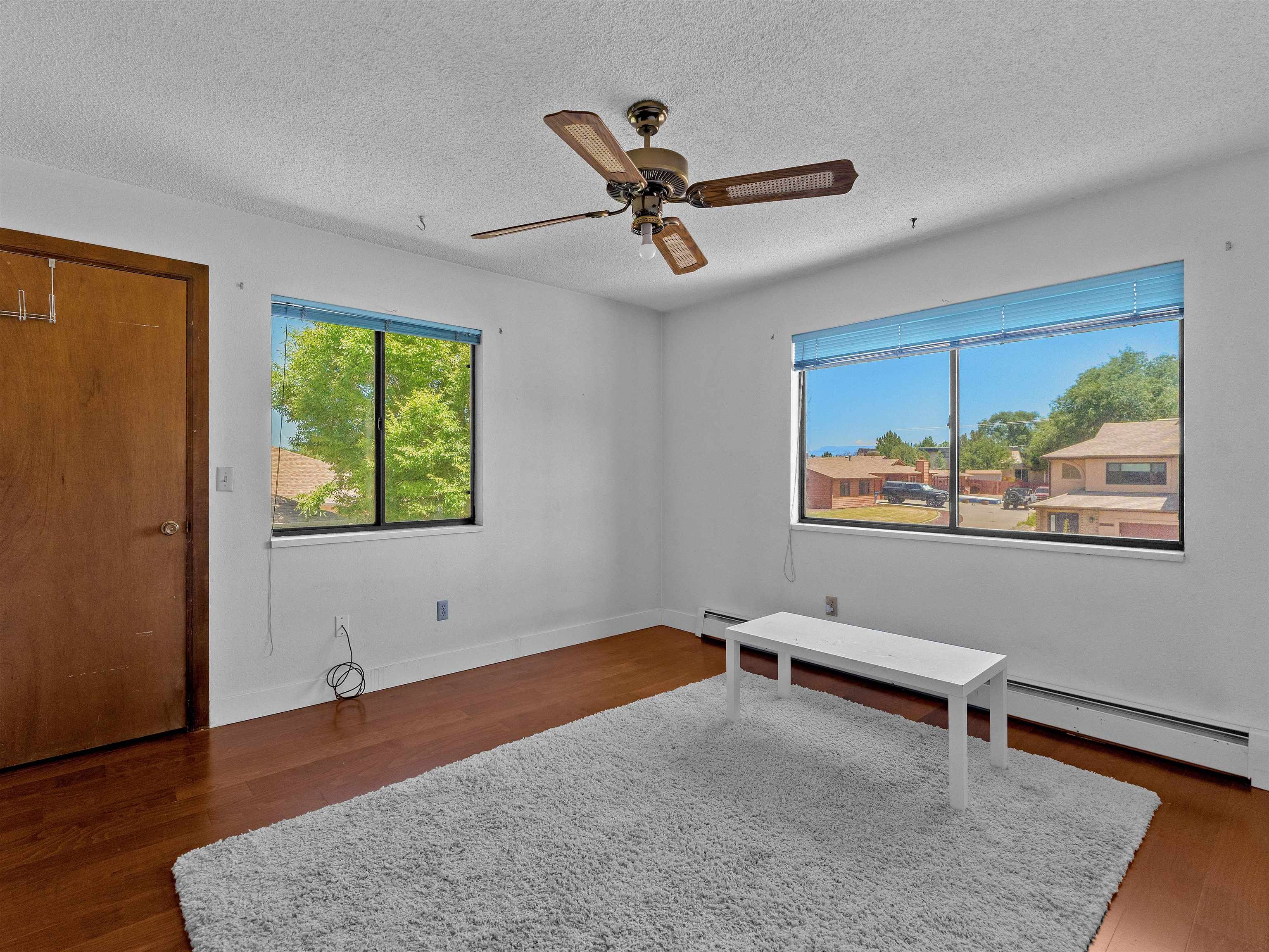 517 Rado Drive, Unit D Grand Junction, CO 81507 - Photo 14 of 24 a view of room with window and ceiling fan