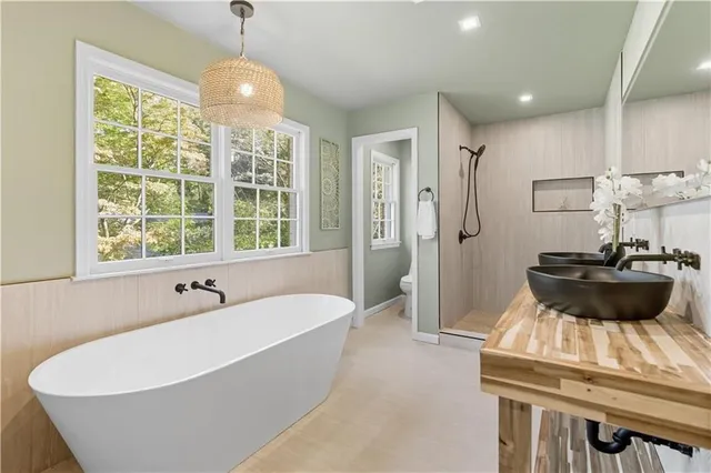 a bathroom with a sink and a bathtub