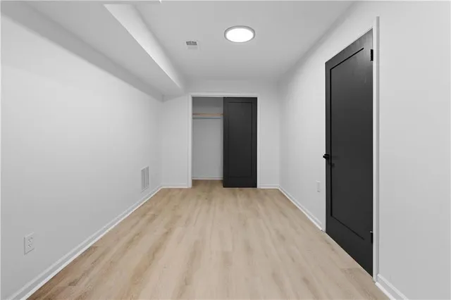 a bathroom with a bathtub and toilet