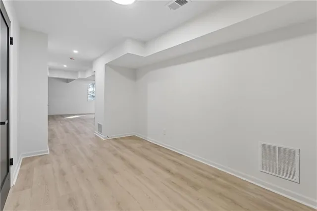 a view of an empty room and window