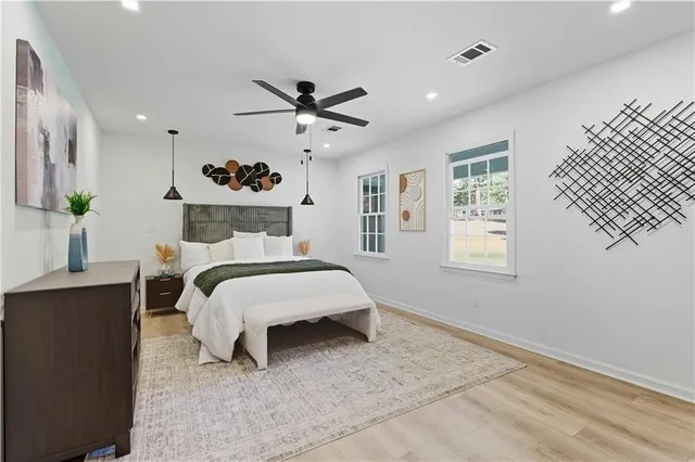 a bed room with a bed and a window