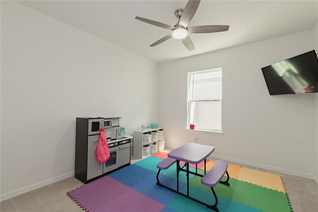 20864 Cherry River Road Land O' Lakes, FL 34638 - Photo 36 of 48 a workspace with furniture and window