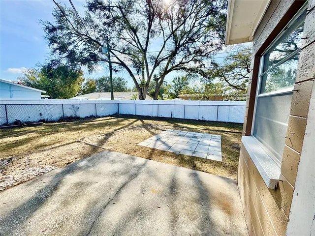 a view of a backyard of a house