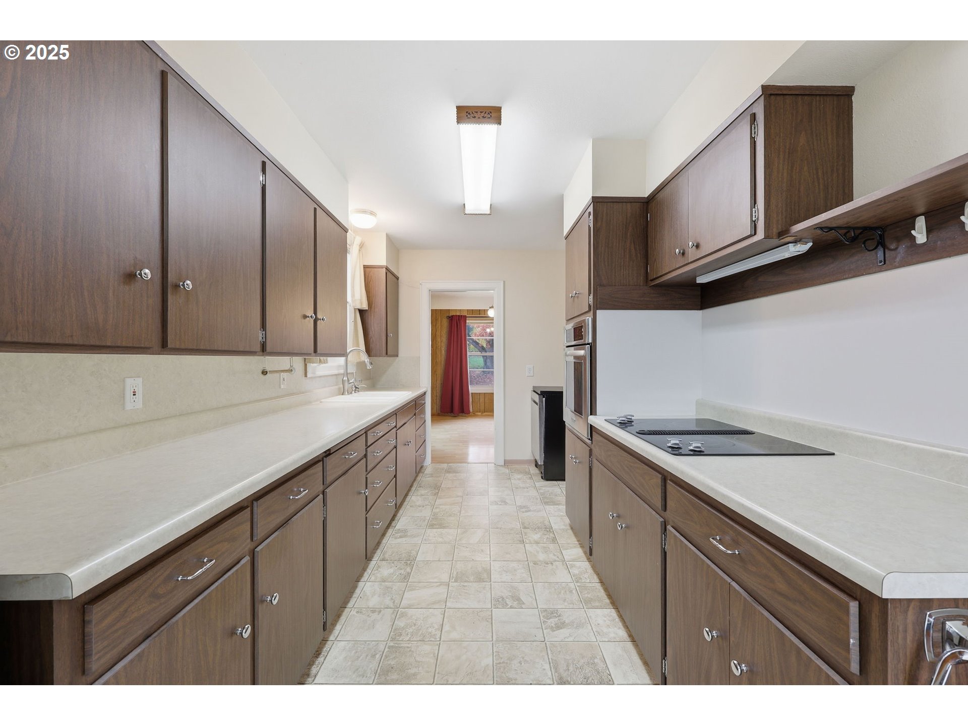 11040 Southeast McCreary Lane Boring, OR 97009 - Photo 11 of 38 a kitchen with a sink stove and cabinets
