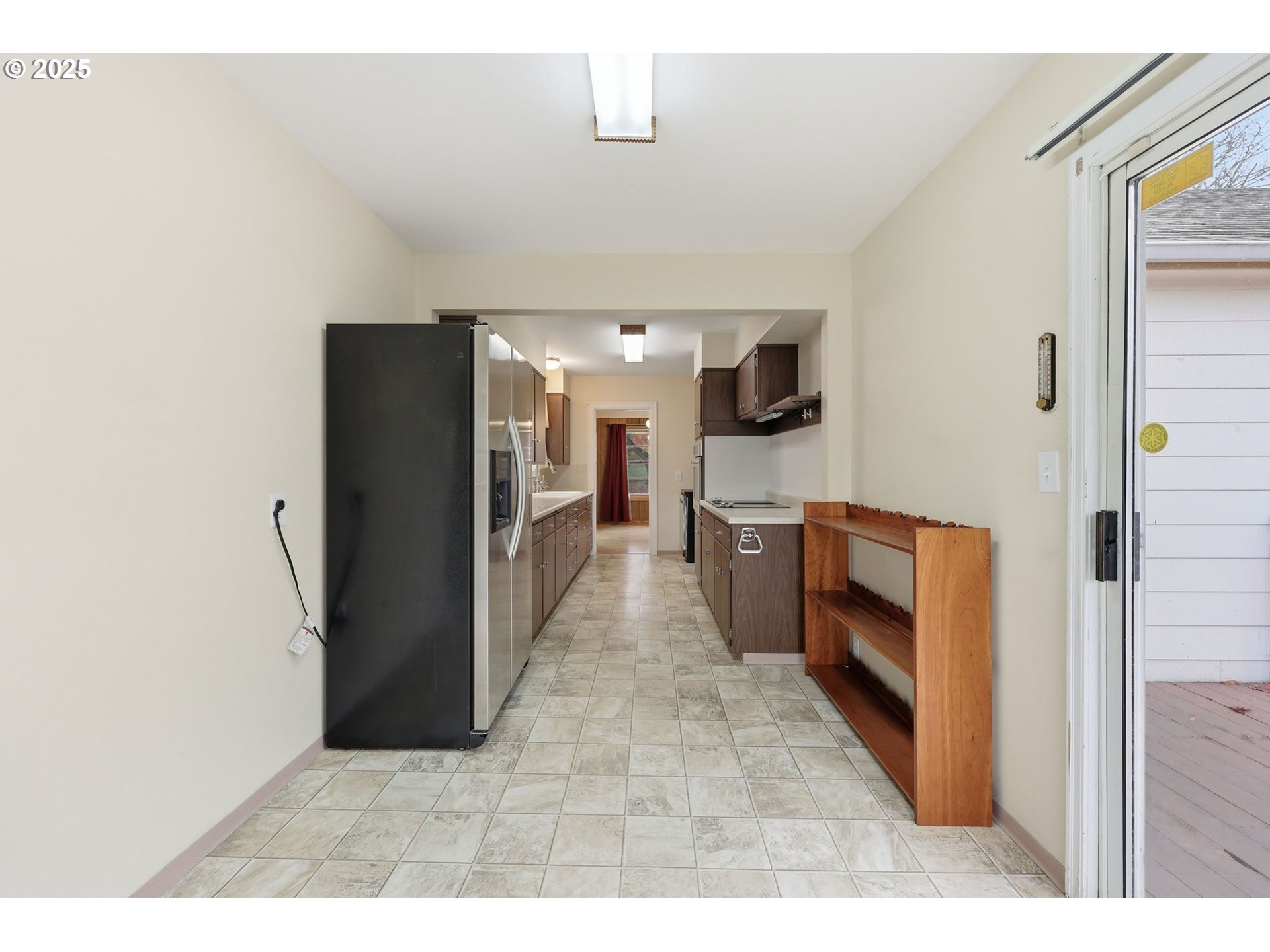 11040 Southeast McCreary Lane Boring, OR 97009 - Photo 13 of 38 a view of a hallway with a kitchen