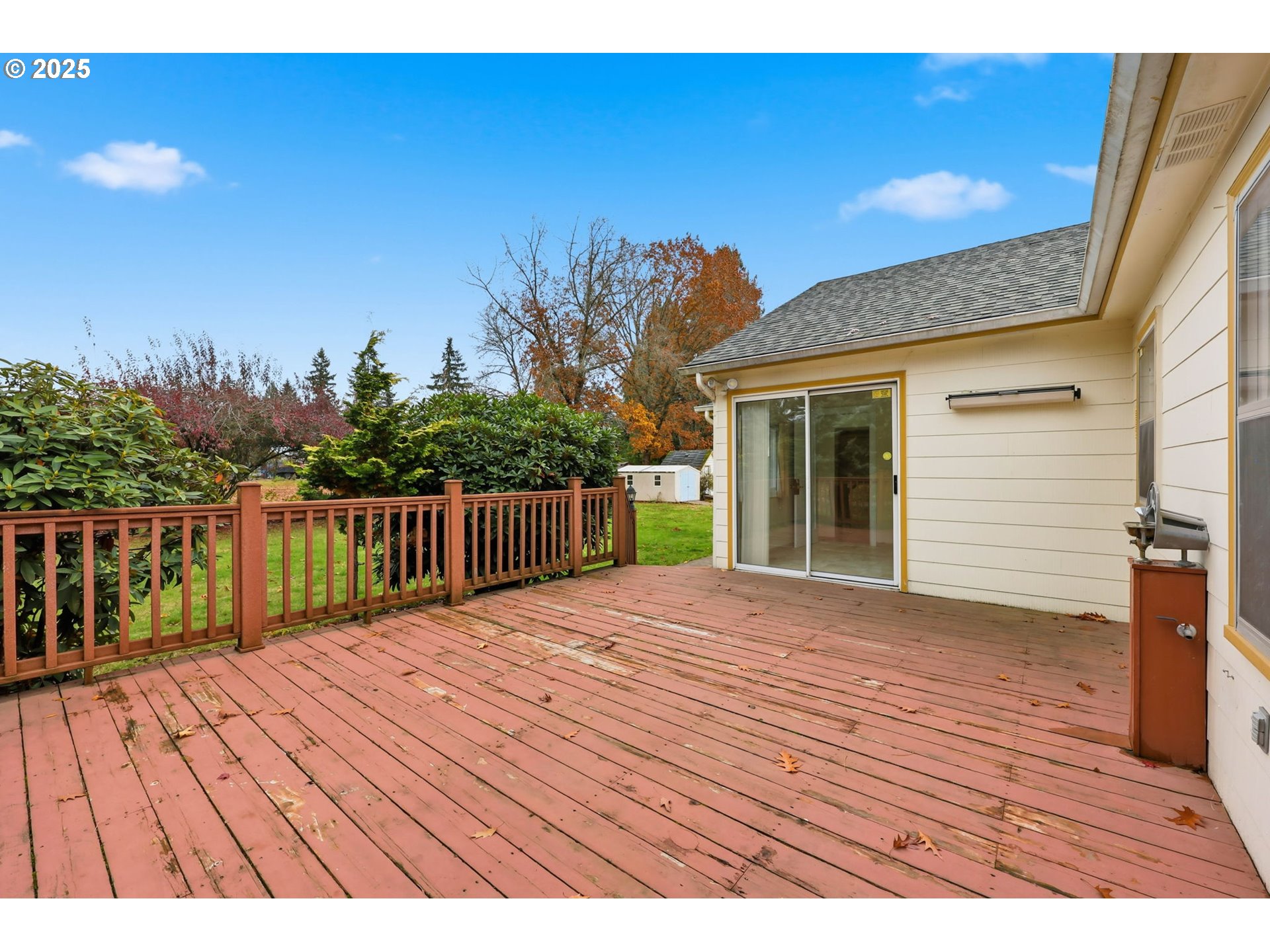 11040 Southeast McCreary Lane Boring, OR 97009 - Photo 31 of 38 a balcony with wooden floor and city view