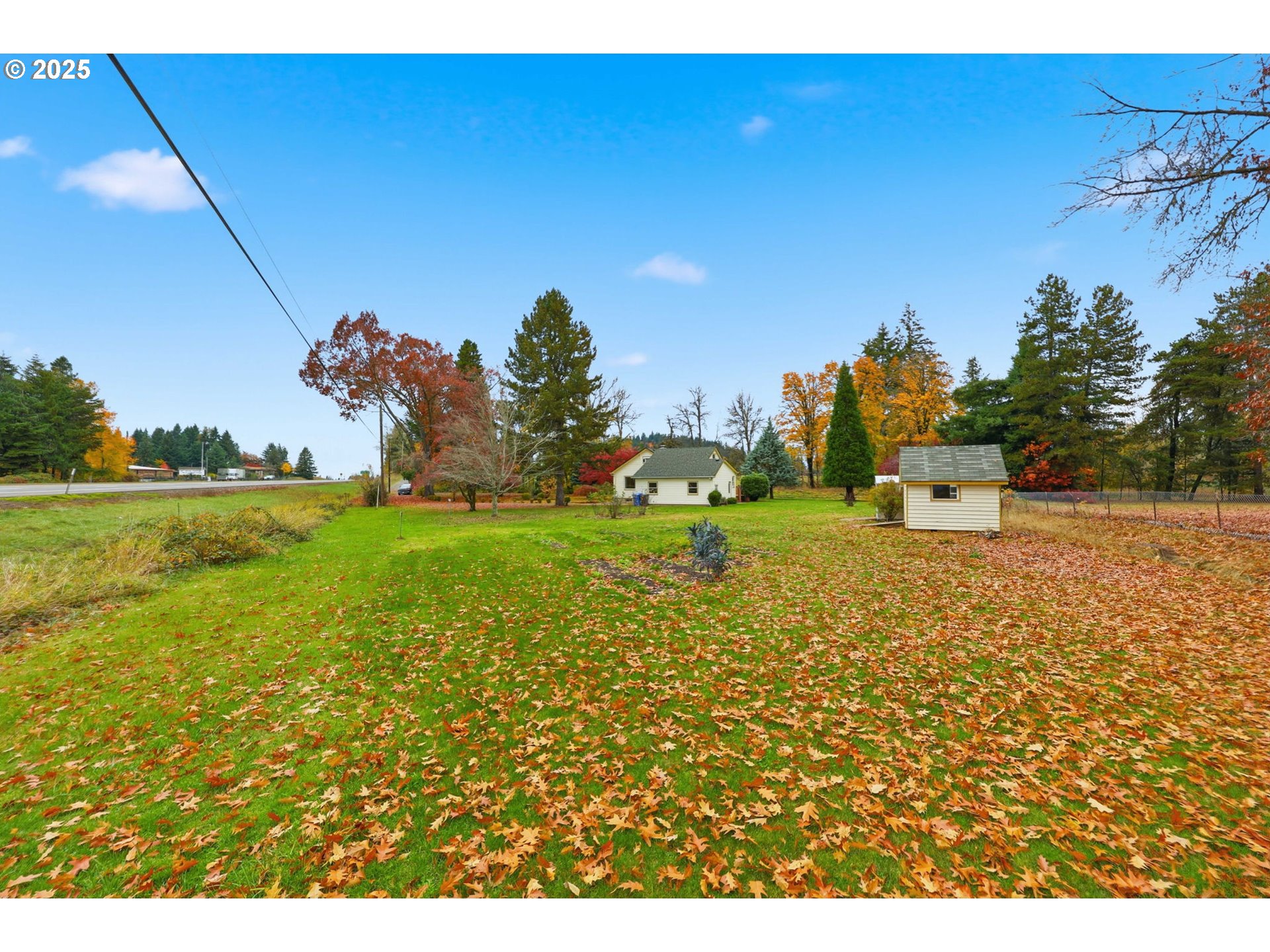 11040 Southeast McCreary Lane Boring, OR 97009 - Photo 35 of 38 a backyard of a house with lots of green space