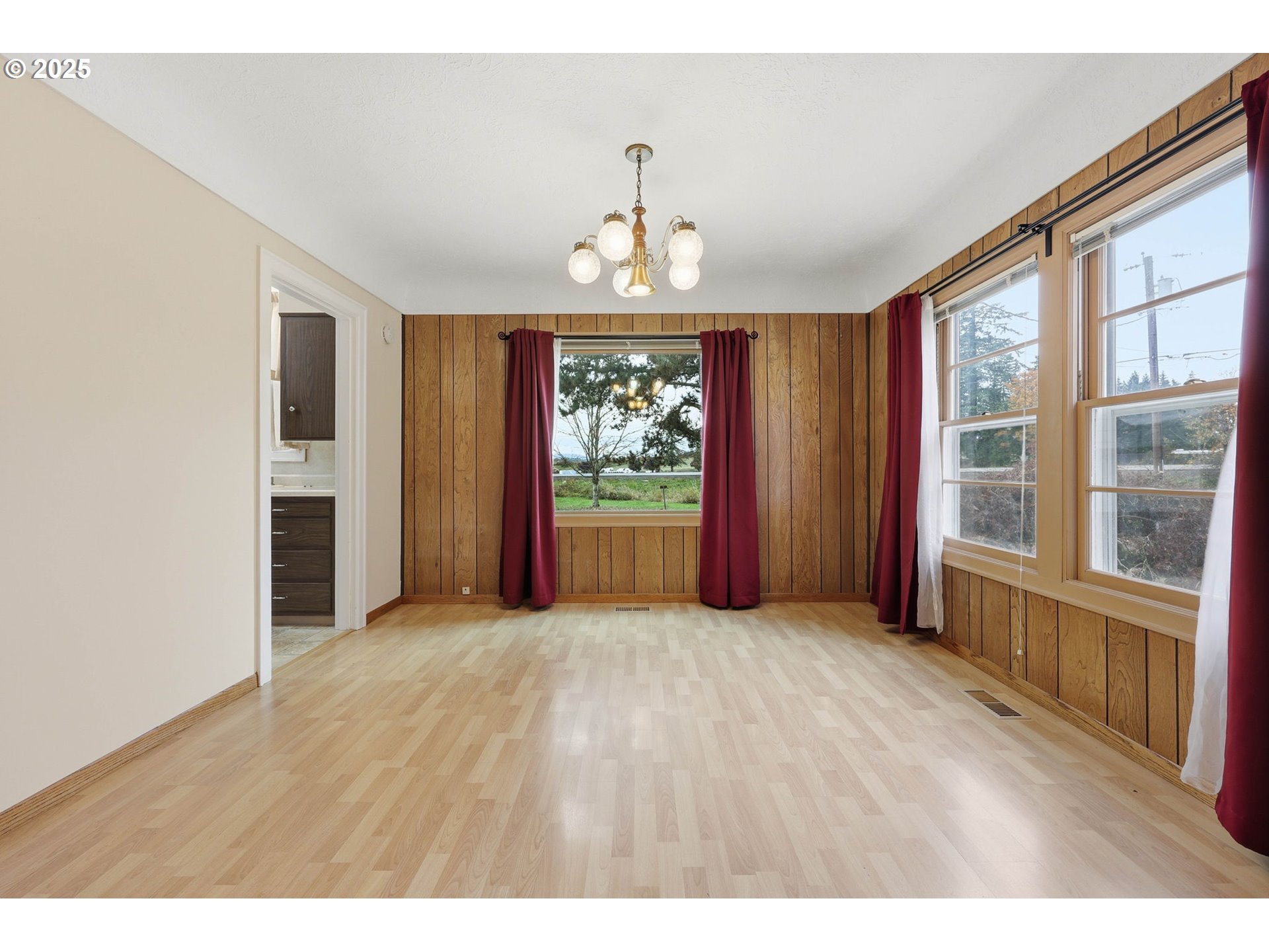 11040 Southeast McCreary Lane Boring, OR 97009 - Photo 5 of 38 a view of an empty room with a window