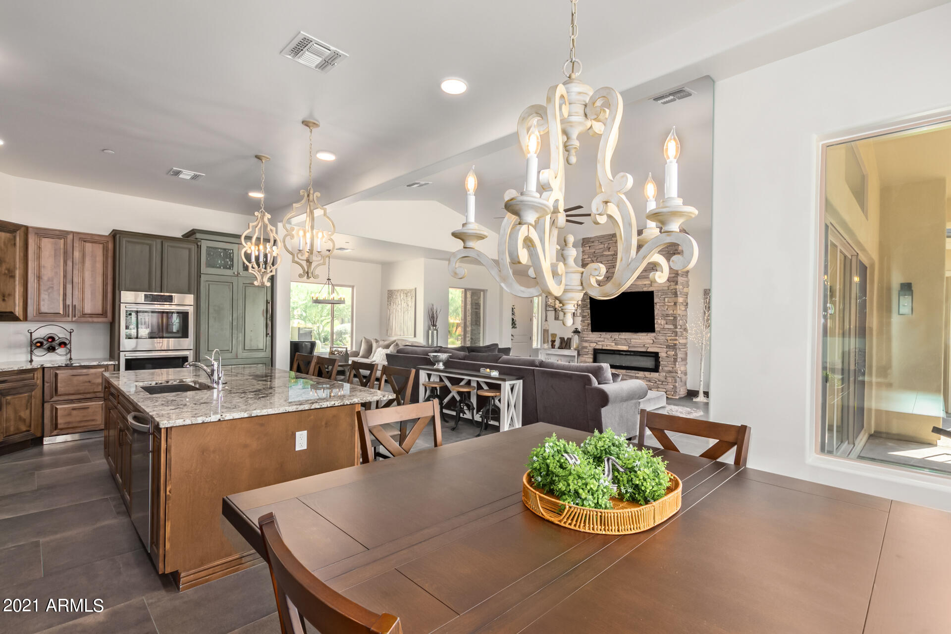 27808 Desierto Drive Rio Verde, AZ 85263 - Photo 12 of 42 a kitchen with a table and chairs