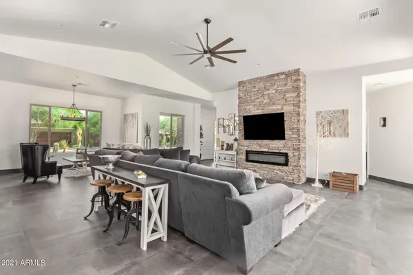 a kitchen with stainless steel appliances granite countertop a stove a sink and a granite counter tops