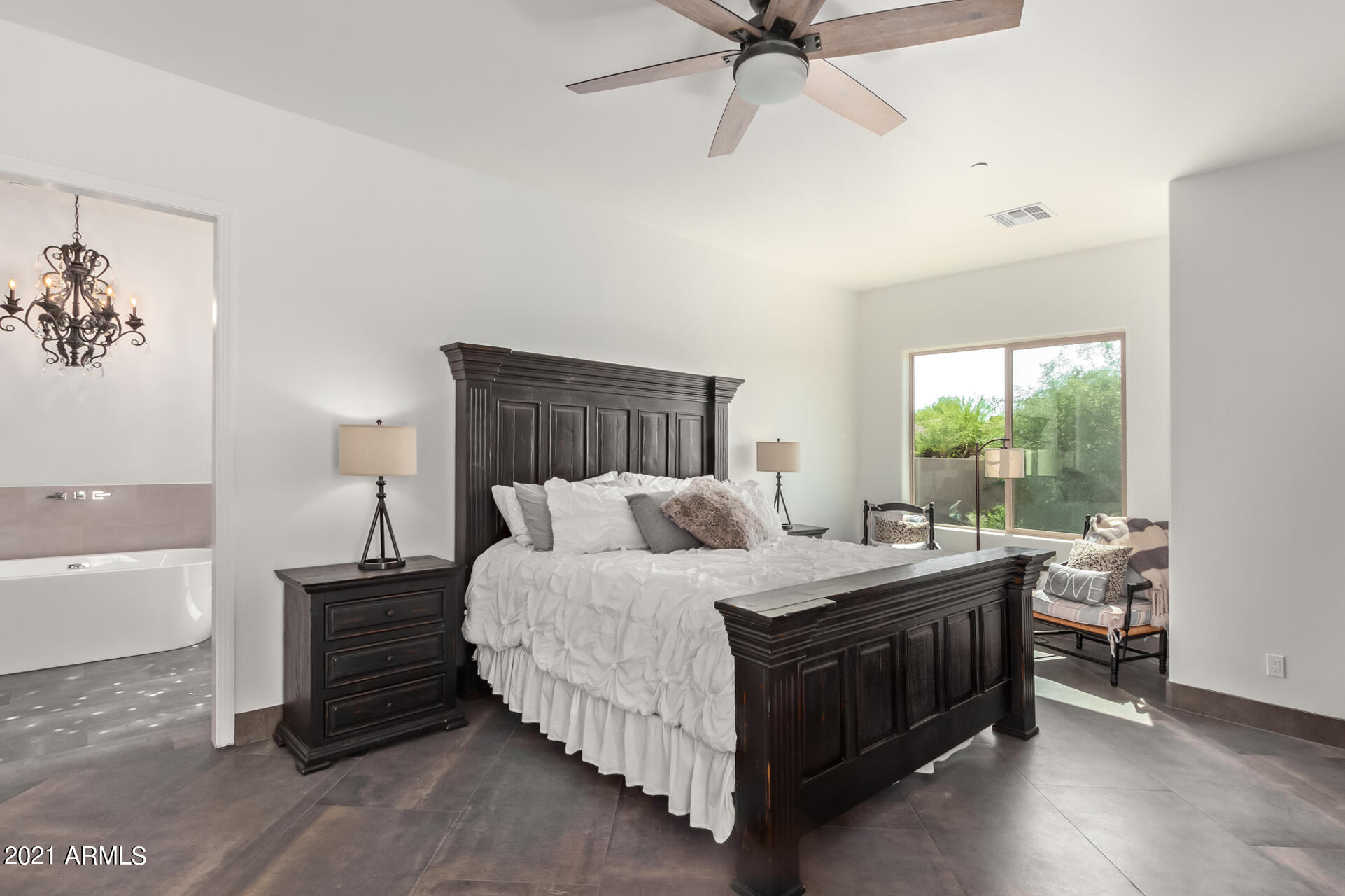 27808 Desierto Drive Rio Verde, AZ 85263 - Photo 20 of 42 a bedroom with a bed and a window