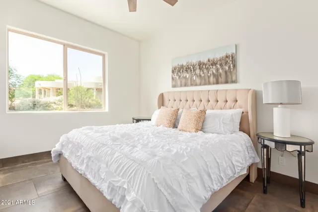 a view of a hallway with wooden walls