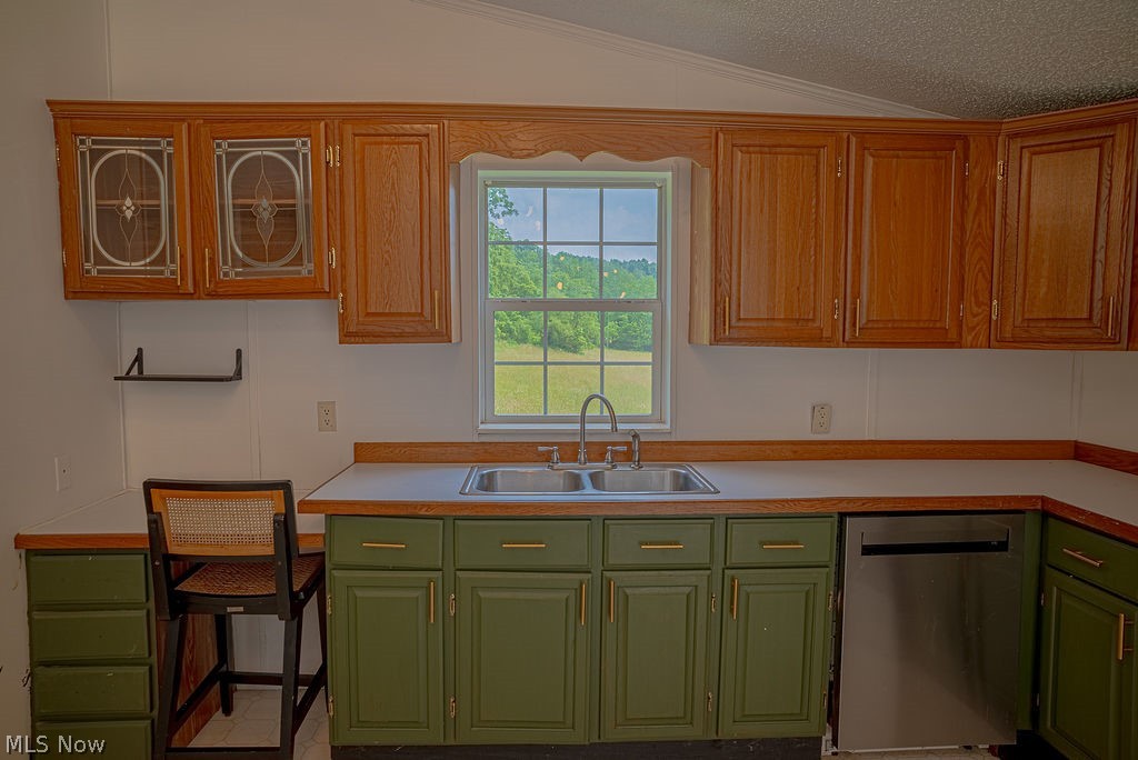 967 Buck Run Road Mineral Wells, WV 26150 - Photo 25 of 50 Kitchen featuring a double stainless steel sink, wood-finish countertops, and a stainless steel dishwasher