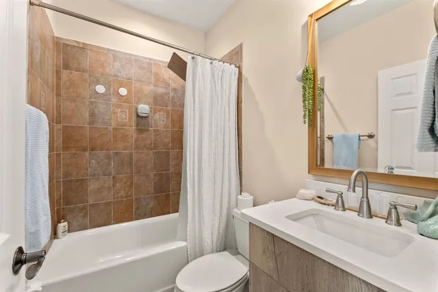 a view of a balcony with plants