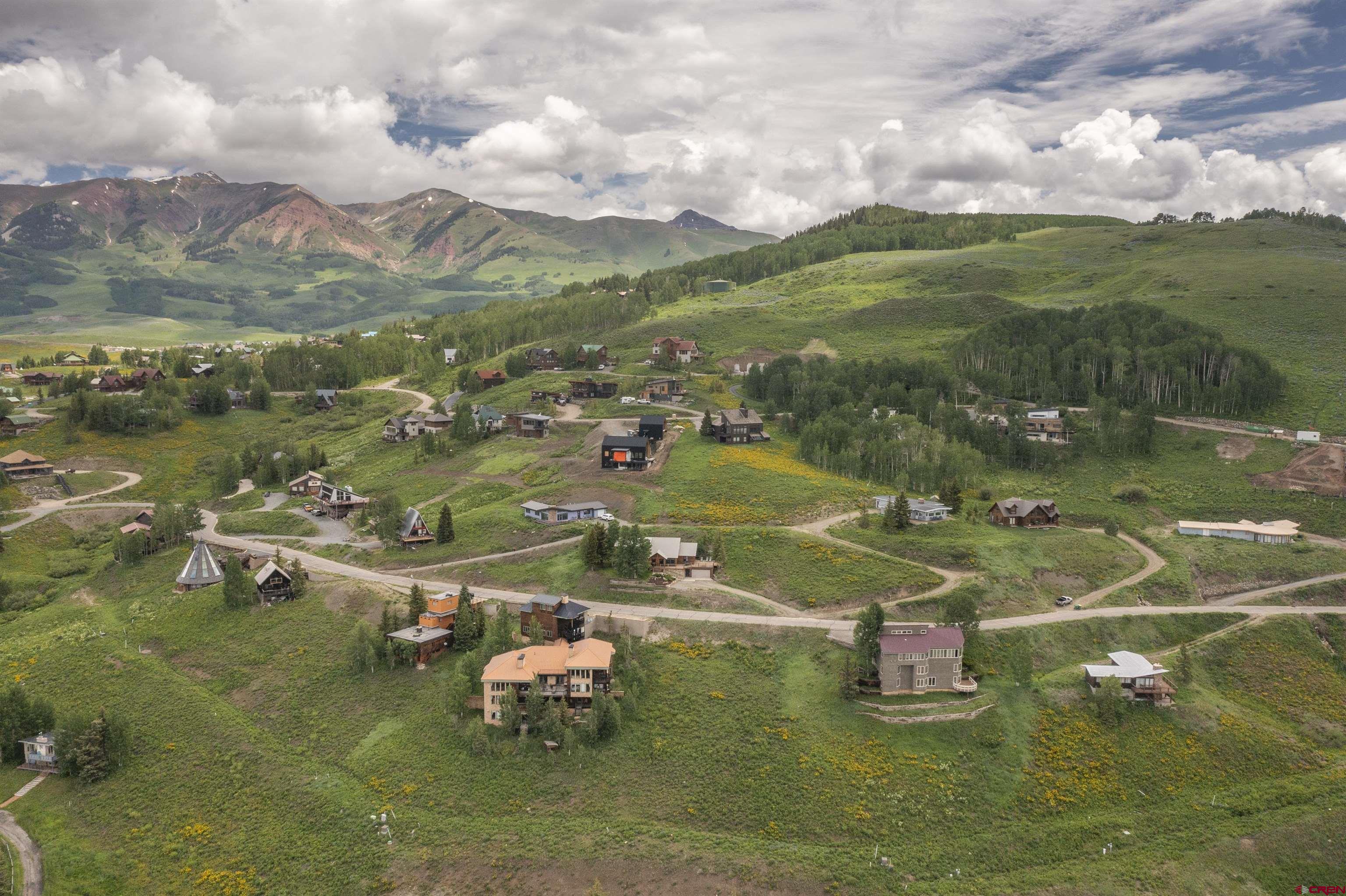 41 Whetstone Road Crested Butte, CO 81225 - Photo 8 of 33 a view of a lake with houses