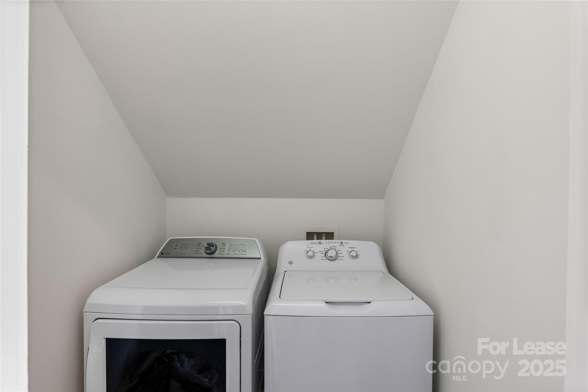 5 Elmore Street Asheville, NC 28804 - Photo 18 of 37 a utility room with dryer and washer