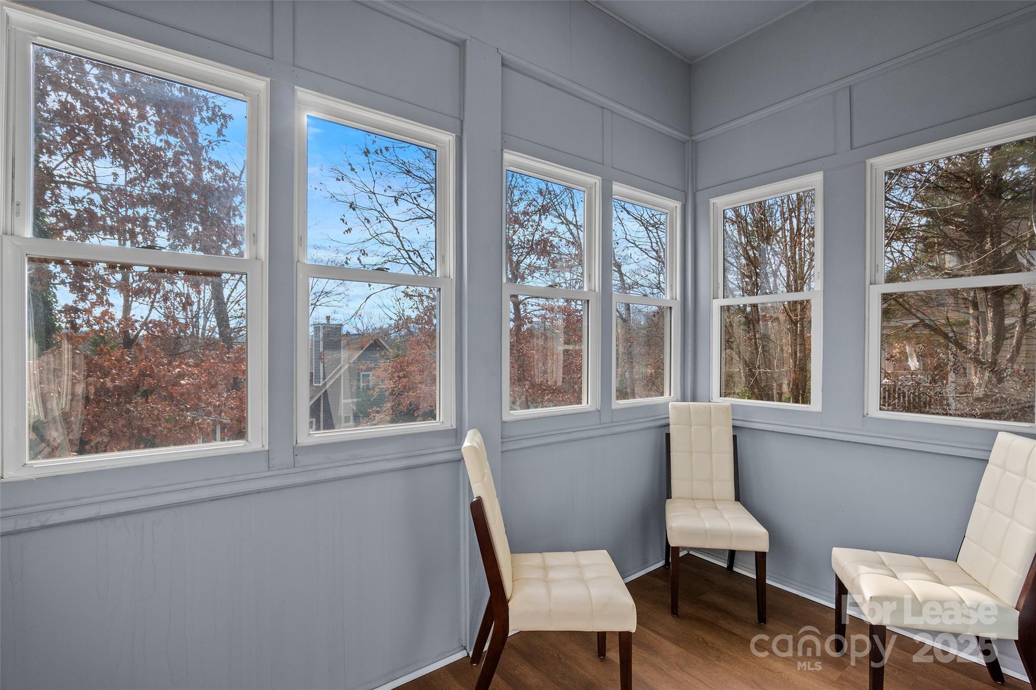 5 Elmore Street Asheville, NC 28804 - Photo 20 of 37 a view of a chair and table in a room