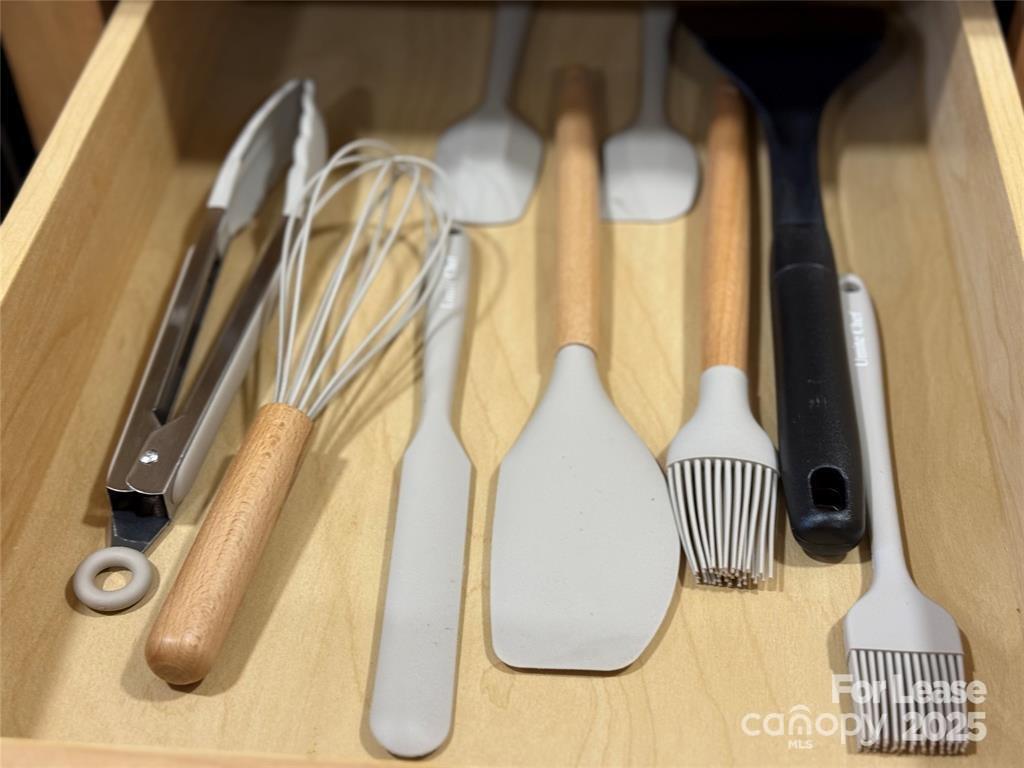 5 Elmore Street Asheville, NC 28804 - Photo 29 of 37 a bathroom with a sink and a mirror