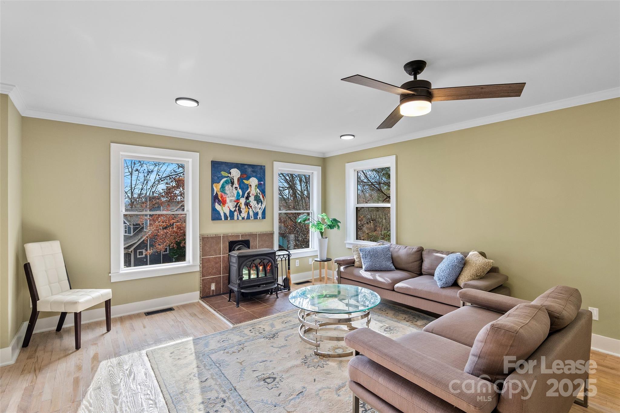 5 Elmore Street Asheville, NC 28804 - Photo 5 of 37 a living room with furniture a rug and a window