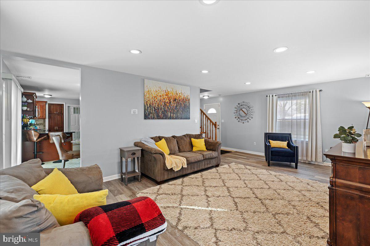 142 Pheasant Lane Willingboro, NJ 08046 - Photo 5 of 24 a living room with furniture and wooden floor