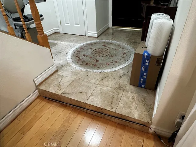 a view of kitchen with wooden floor