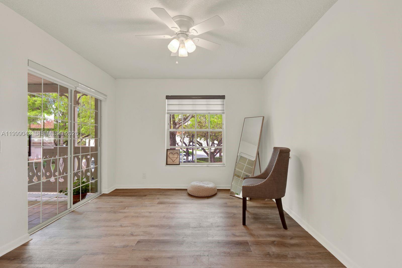10441 Mahogany Key Circle, Unit 202 Miami, FL 33196 - Photo 20 of 42 a view of living room with furniture and a large window