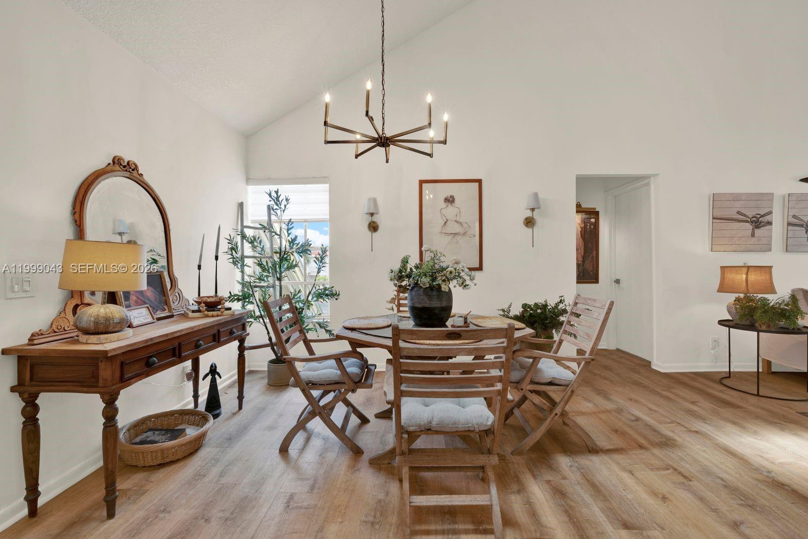 10441 Mahogany Key Circle, Unit 202 Miami, FL 33196 - Photo 2 of 42 a view of a dining room with furniture window and wooden floor