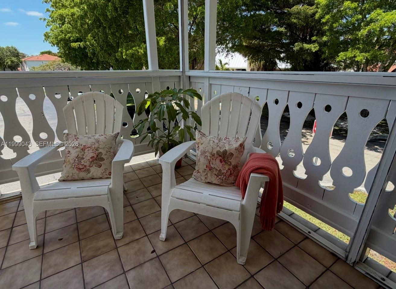 10441 Mahogany Key Circle, Unit 202 Miami, FL 33196 - Photo 25 of 42 a view of outdoor chair with outdoor seating