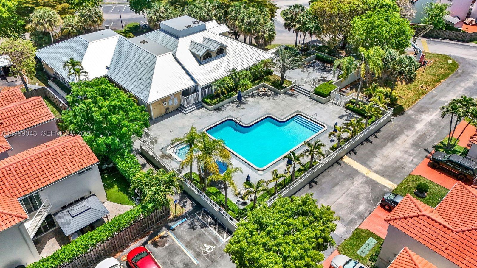 10441 Mahogany Key Circle, Unit 202 Miami, FL 33196 - Photo 33 of 42 an aerial view of a house with a yard