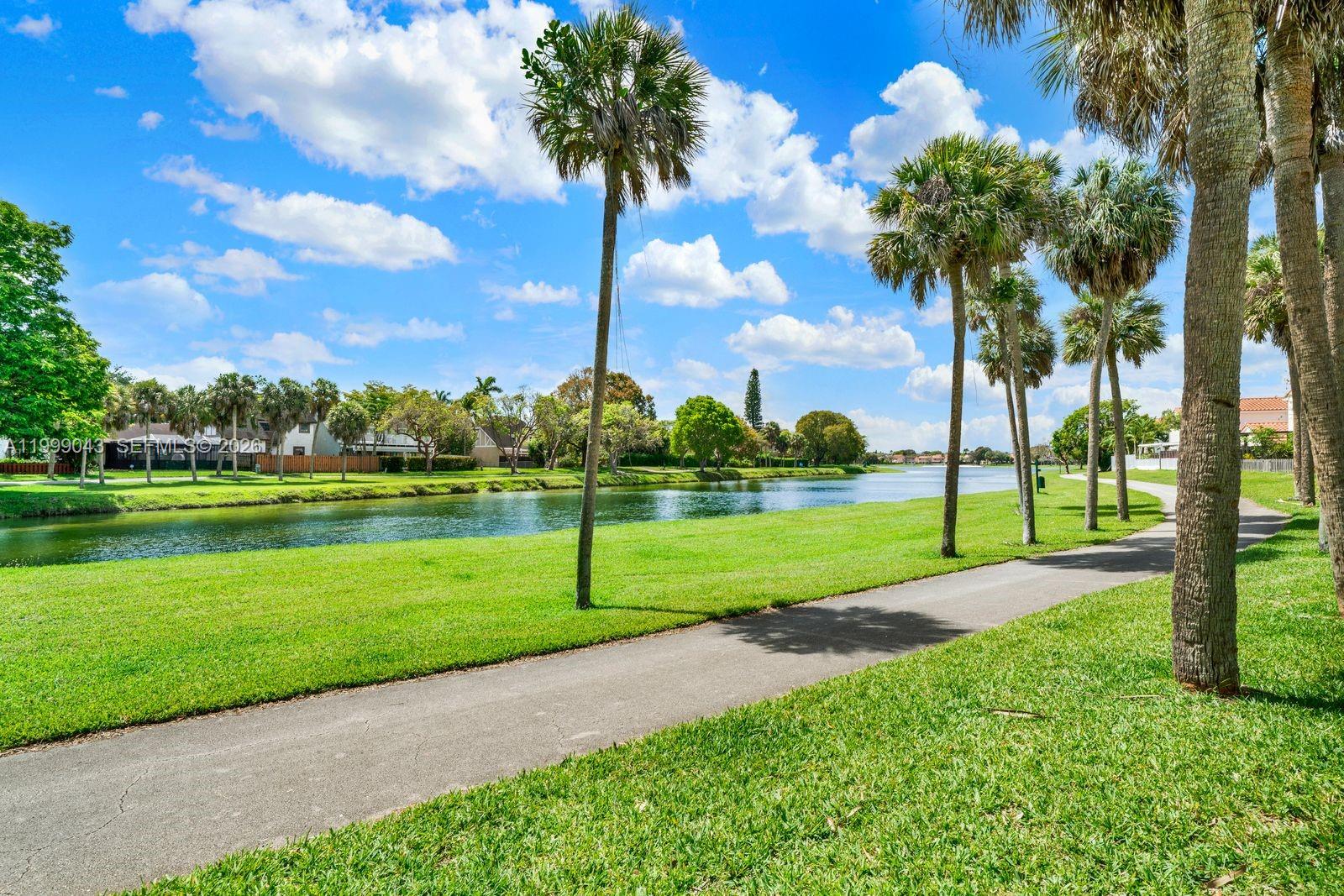 10441 Mahogany Key Circle, Unit 202 Miami, FL 33196 - Photo 36 of 42 a view of a park and trees