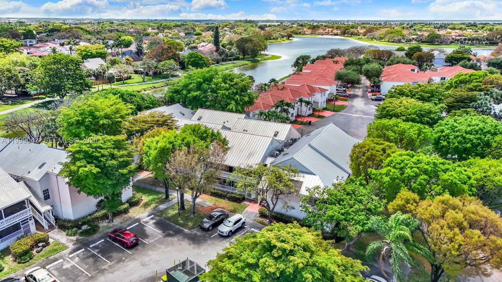 10441 Mahogany Key Circle, Unit 202 Miami, FL 33196 - Photo 39 of 42 an aerial view of residential houses with outdoor space