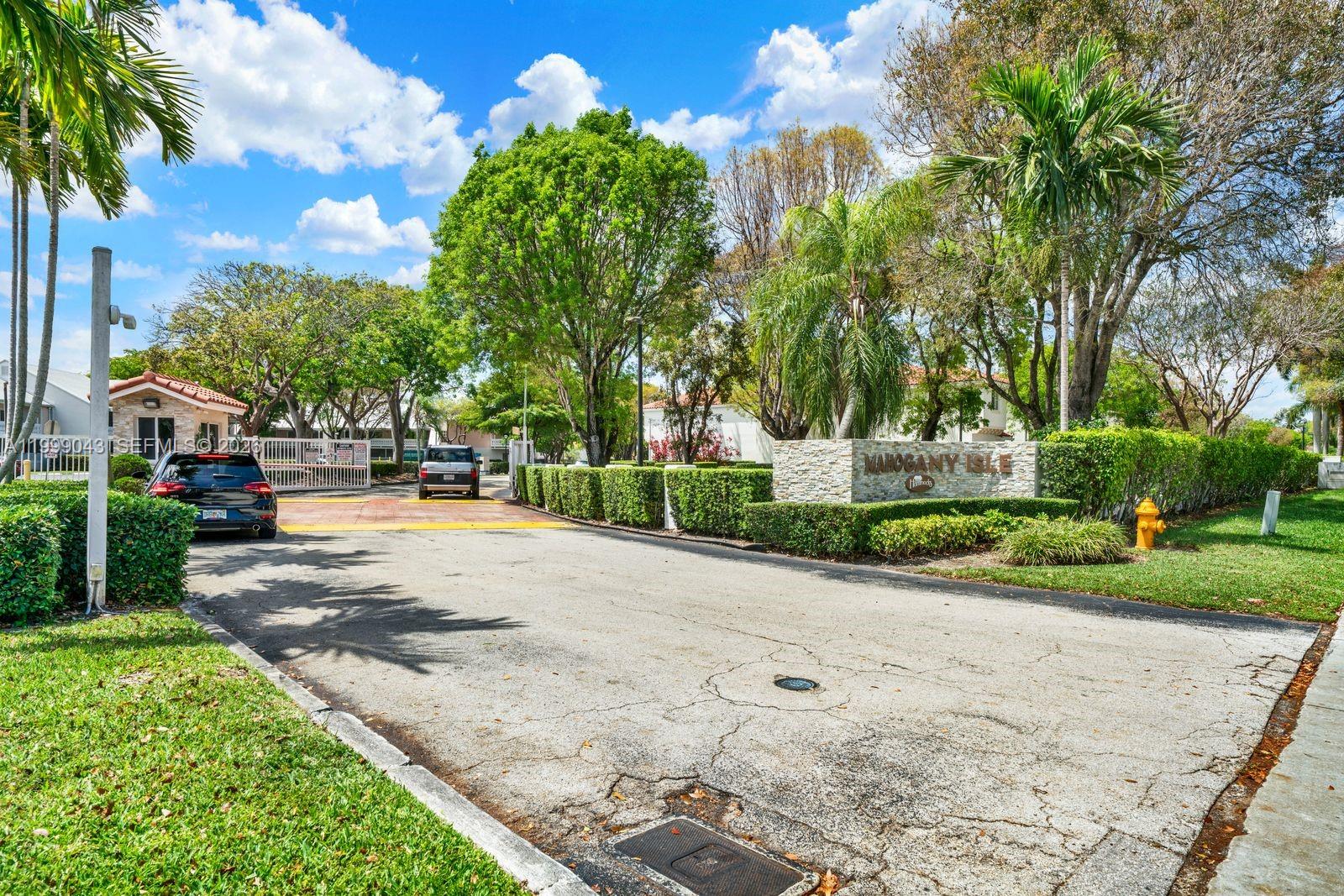 10441 Mahogany Key Circle, Unit 202 Miami, FL 33196 - Photo 42 of 42 a view of park with large trees