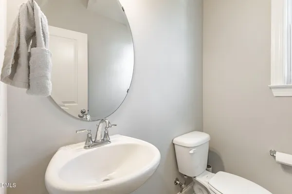 a bathroom with a toilet and sink
