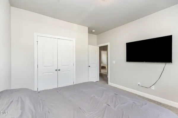 a view of a livingroom with a flat screen tv