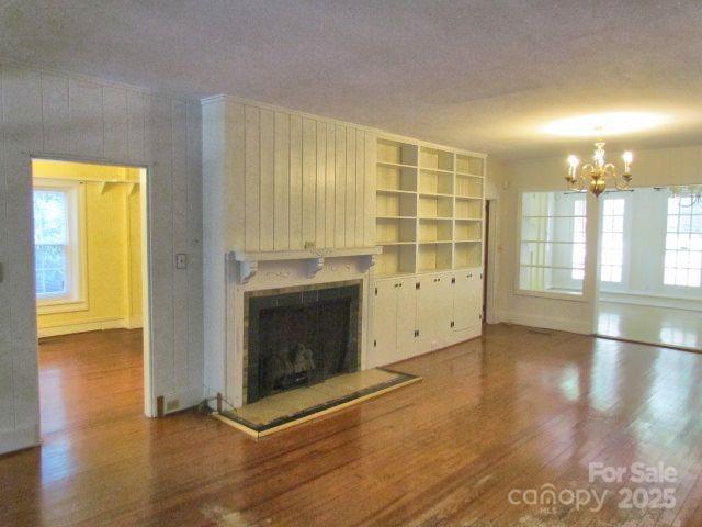 3465 Lynn Road Tryon, NC 28782 - Photo 13 of 31 a view of an empty room with glass door and wooden floor
