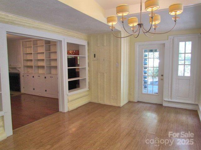 3465 Lynn Road Tryon, NC 28782 - Photo 17 of 31 wooden floor in an empty room with a window
