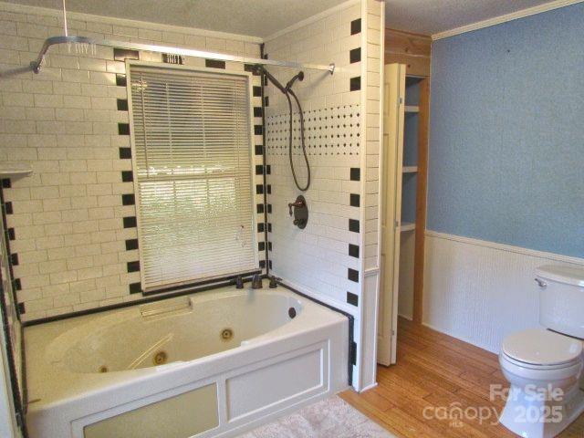 3465 Lynn Road Tryon, NC 28782 - Photo 25 of 31 a bathroom with a bathtub and a shower