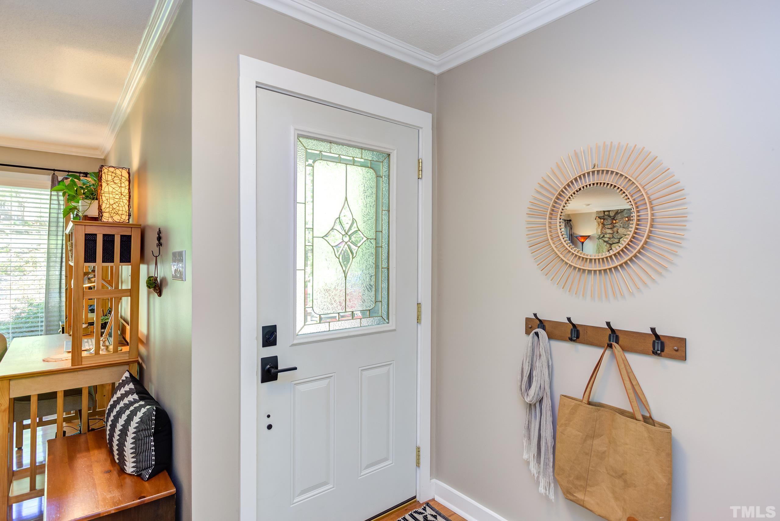 6316 Rushingbrook Drive Raleigh, NC 27612 - Photo 4 of 50 a bathroom with a sink and a mirror
