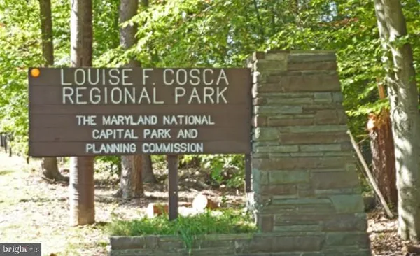 a view of an empty room with windows