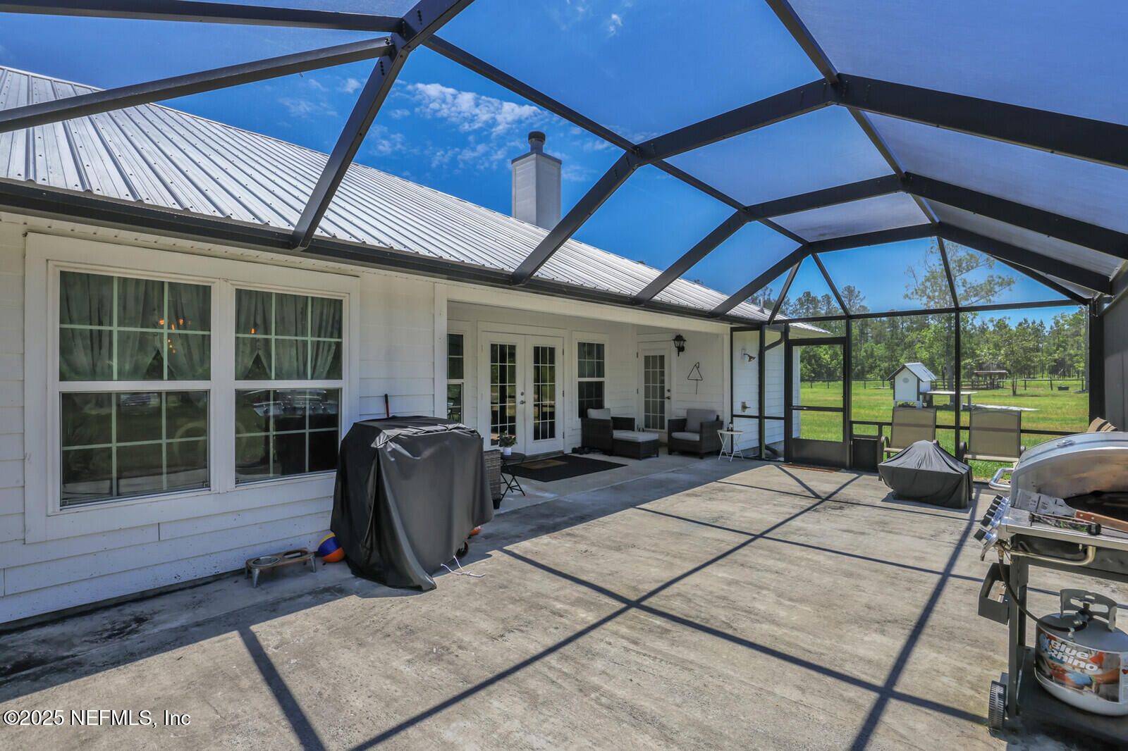 34390 Mitigation Trail Callahan, FL 32011 - Photo 16 of 70 Screened-in Patio