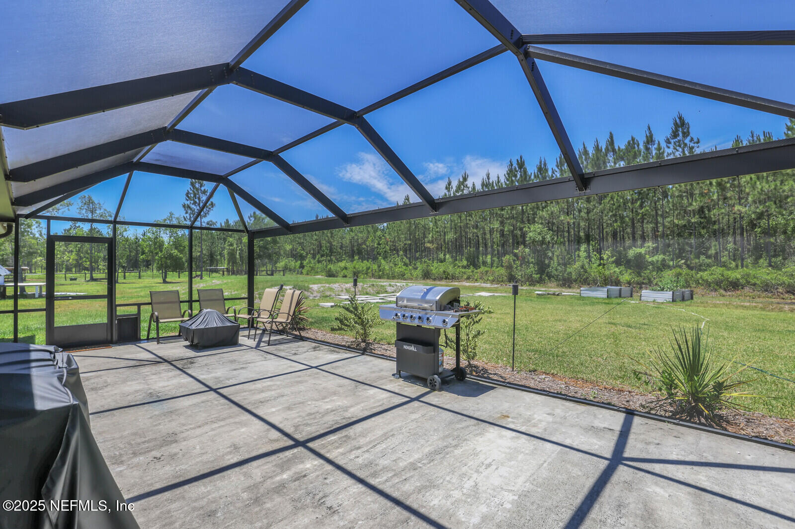 34390 Mitigation Trail Callahan, FL 32011 - Photo 17 of 70 Screened-in Patio