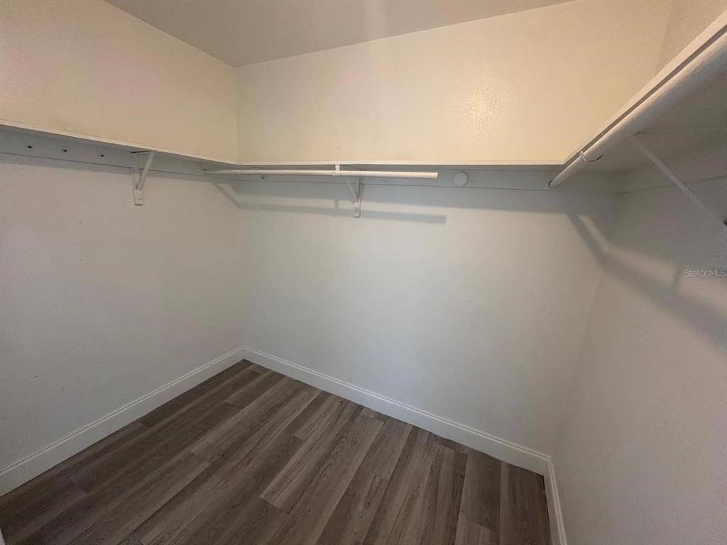 4033 Henley Road, Unit 1707 Orlando, FL 32839 - Photo 54 of 66 a view of an empty walk in closet